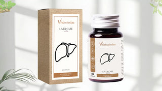Vrishvrindaa Liver Care supplement bottle and packaging on a light background with plants.