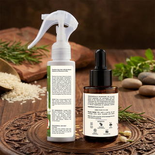 Vrishvrindaa Rosemary and Rice Water Hair Mist with Rosemary Essential Oil displayed with fresh rosemary on a wooden surface.
